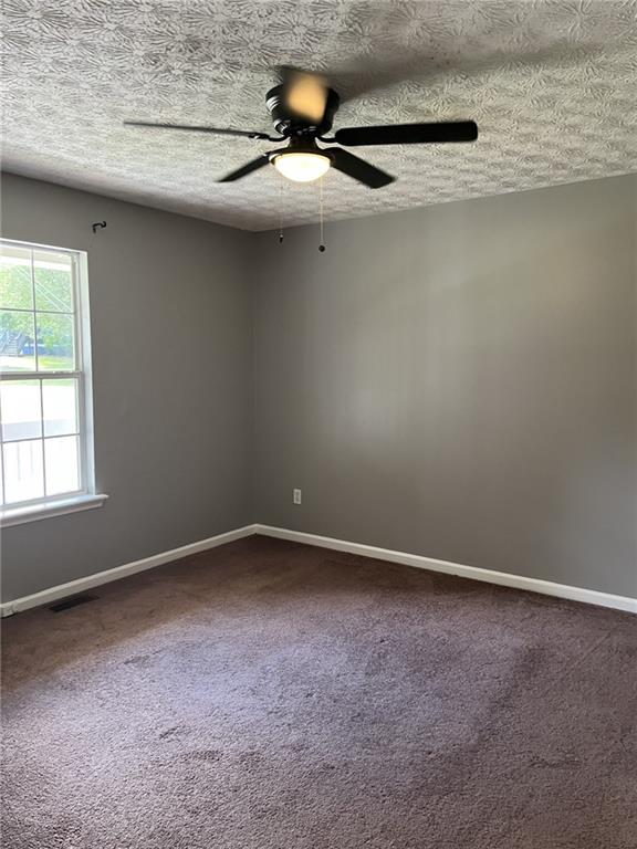 128 Tanner Drive Dallas, GA 30157 - Photo 13 of 23 a view of a small space with wooden floor