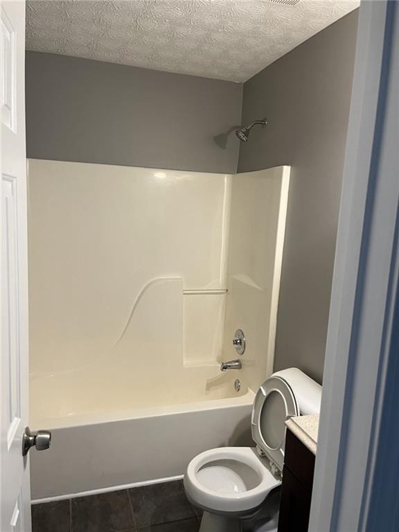 128 Tanner Drive Dallas, GA 30157 - Photo 19 of 23 a bathroom with a bathtub and sink
