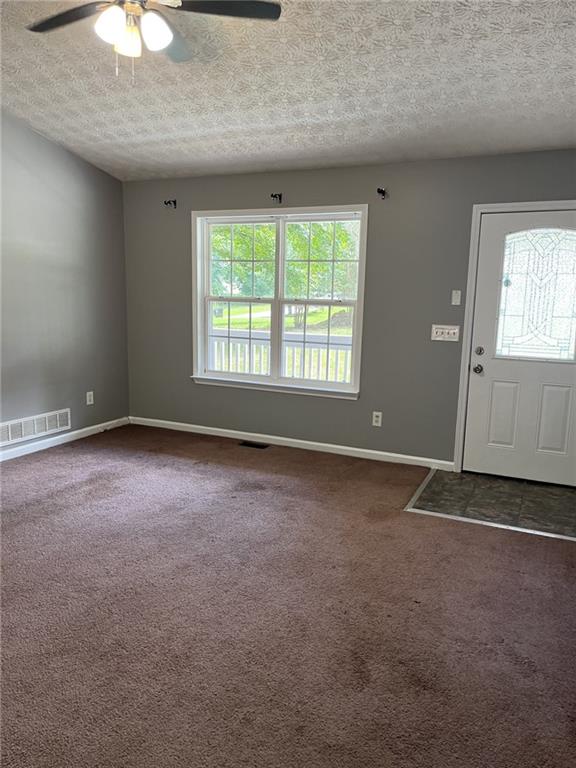 128 Tanner Drive Dallas, GA 30157 - Photo 4 of 23 an empty room with a window