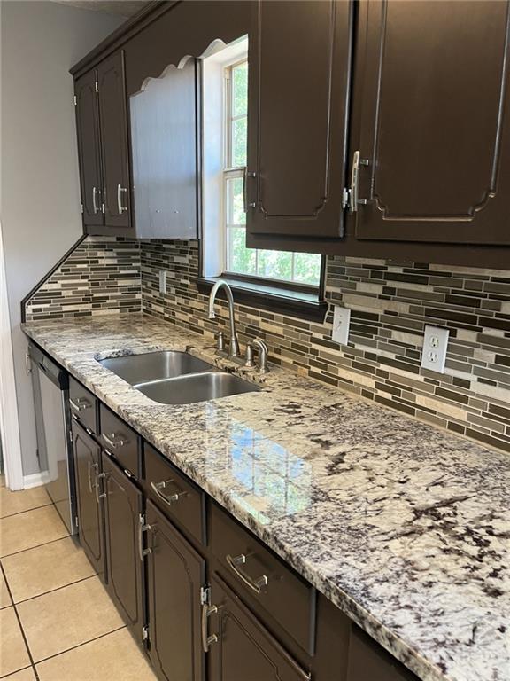 128 Tanner Drive Dallas, GA 30157 - Photo 8 of 23 a kitchen with sink and mirror