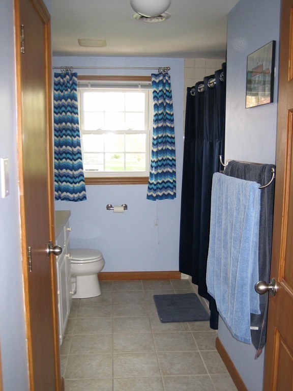 6 Rachel Road Dracut, MA 01826 - Photo 16 of 25 a bathroom with a toilet and a shower