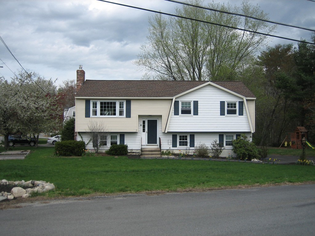 6 Rachel Road Dracut, MA 01826 - Photo 25 of 25 a front view of a house with a yard
