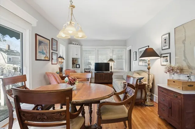 a kitchen with stainless steel appliances granite countertop a sink a stove and cabinets