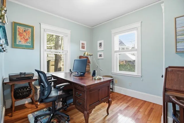 a bathroom with a shower curtain and a sink