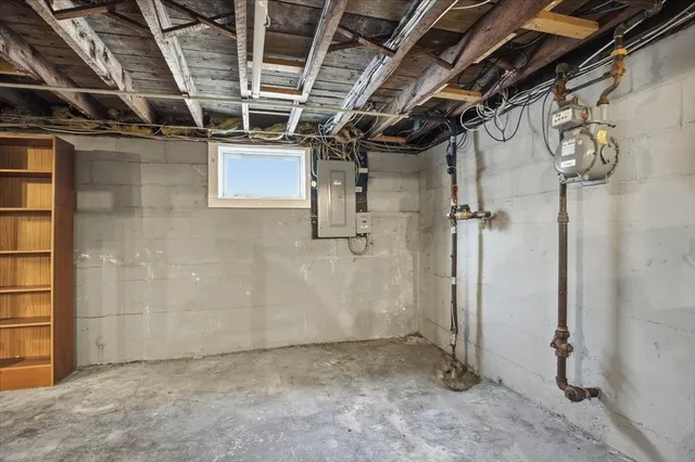 a picture of a room with a white wall and a painting