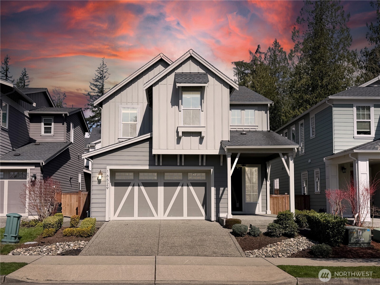 16529 White Mountain Road Southeast Monroe, WA 98272 - Photo 1 of 34 a front view of a house with garden