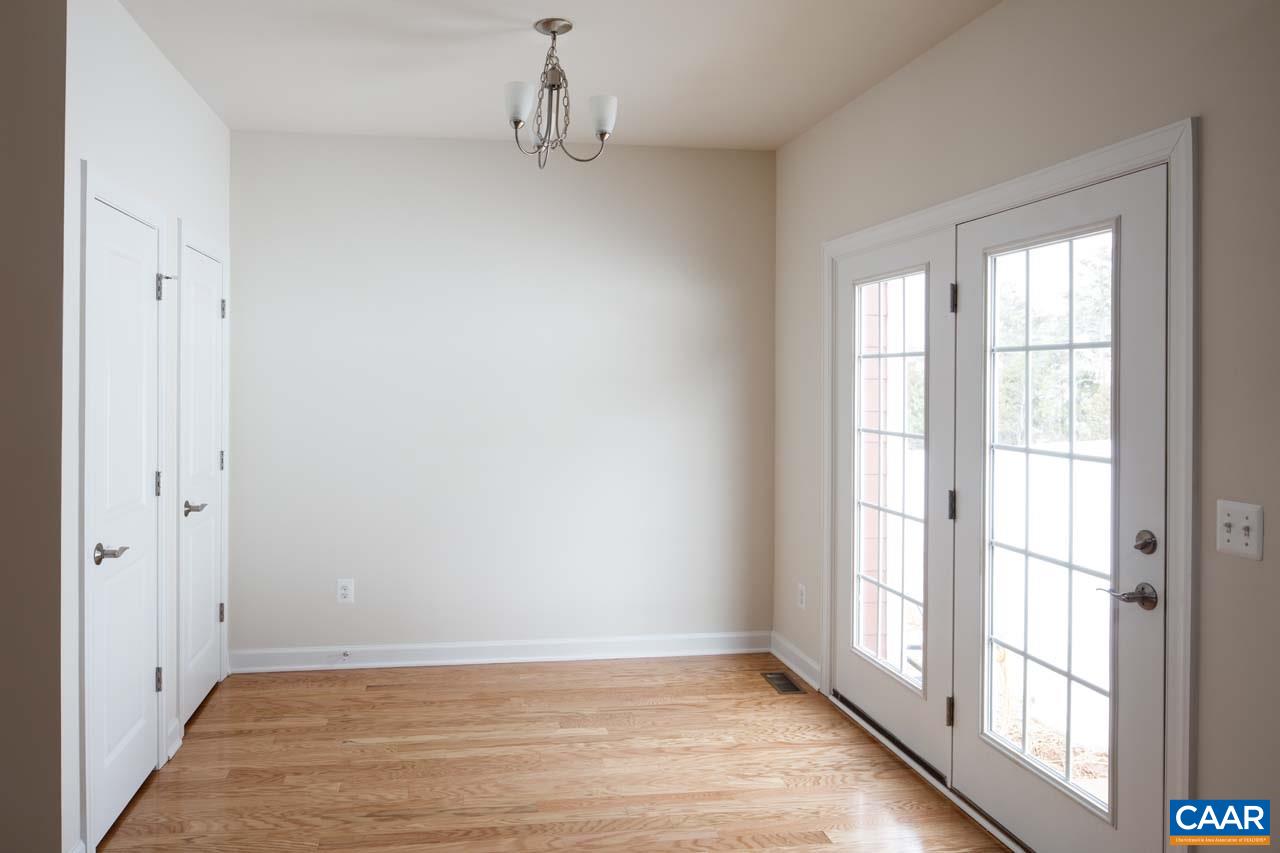 439 Rolkin Road Charlottesville, VA 22911 - Photo 8 of 26 a view of an empty room with a window