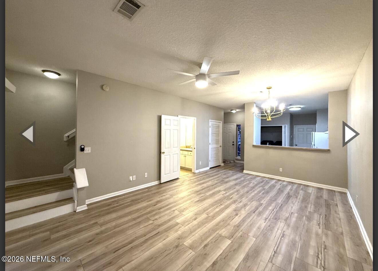 7850 Melvin Road Jacksonville, FL 32210 - Photo 5 of 12 a view of an empty room and window