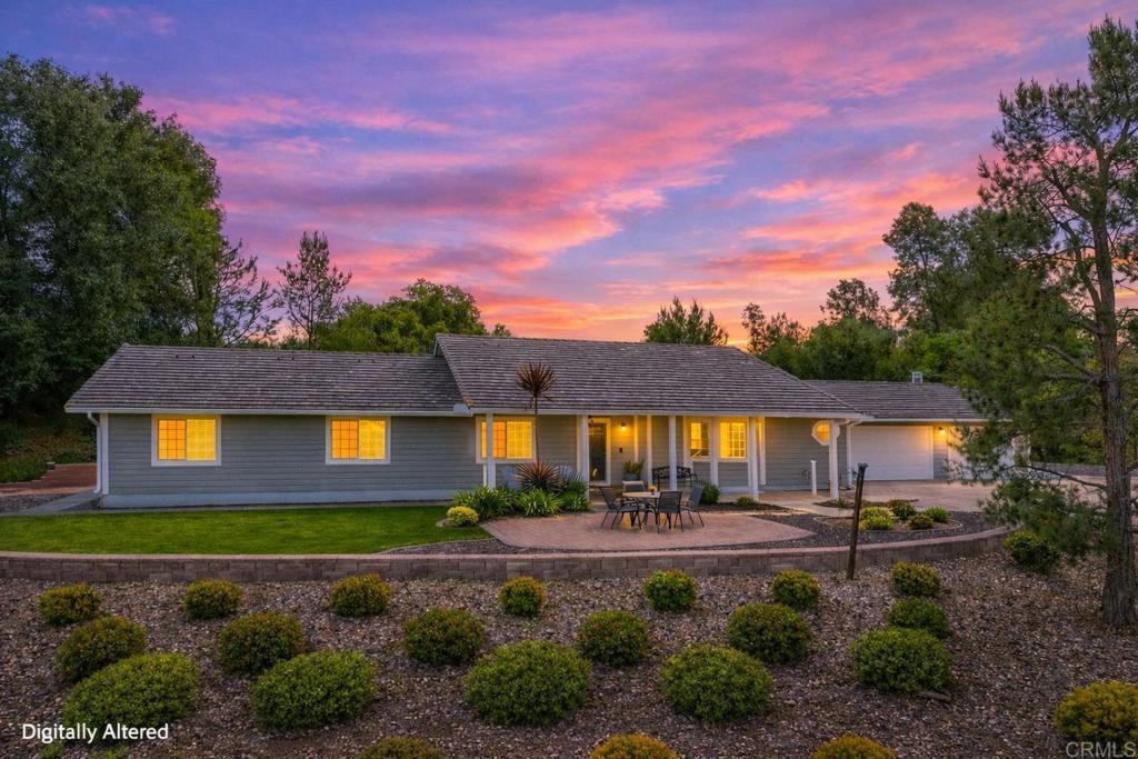 30405 Del Rey Road Temecula, CA 92591 - Photo 2 of 46 a front view of a house with garden