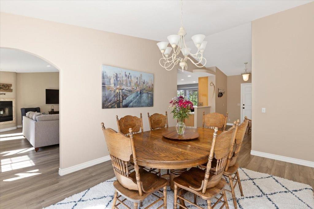 30405 Del Rey Road Temecula, CA 92591 - Photo 40 of 46 a view of a dining room with furniture and chandelier