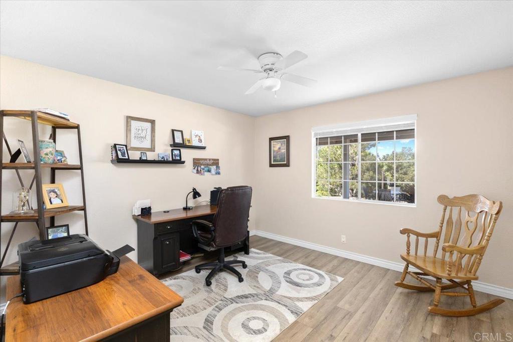 30405 Del Rey Road Temecula, CA 92591 - Photo 7 of 46 a view of a workspace with furniture and a window