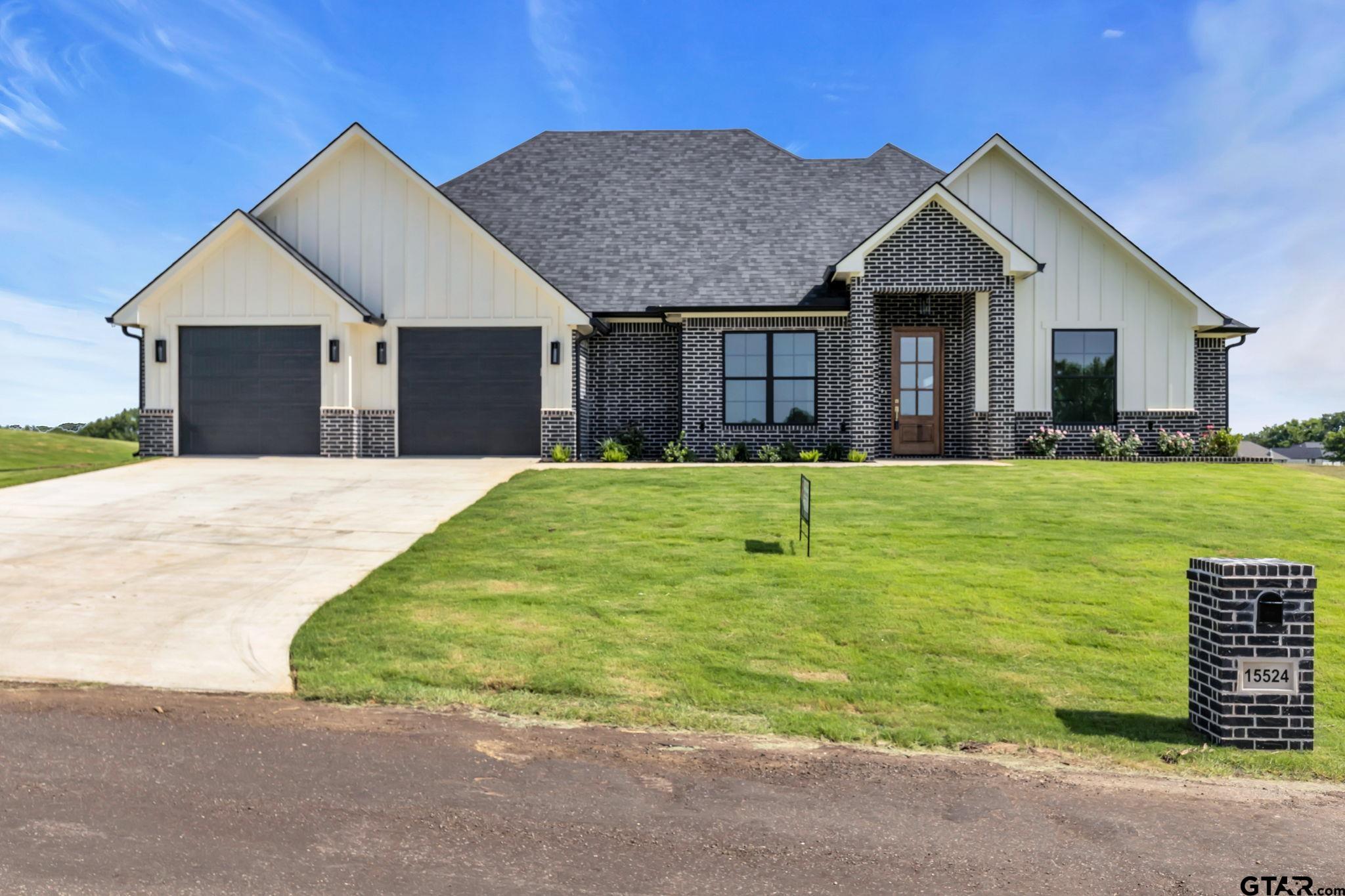 15524 County Road 434 Lindale, TX 75771 - Photo 1 of 23 a front view of house with yard and trees