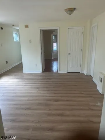 a view of a room with an empty space