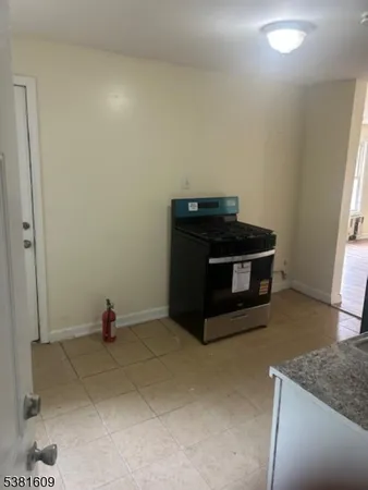 a view of kitchen with a sink