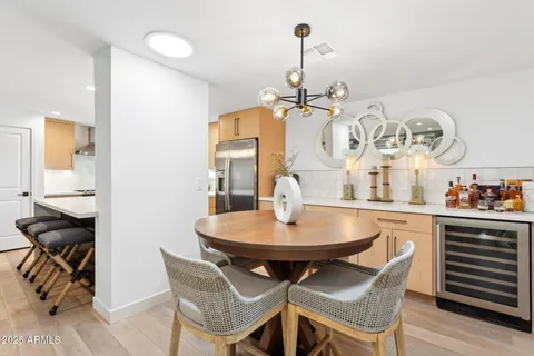 a bathroom with a mirror and sink