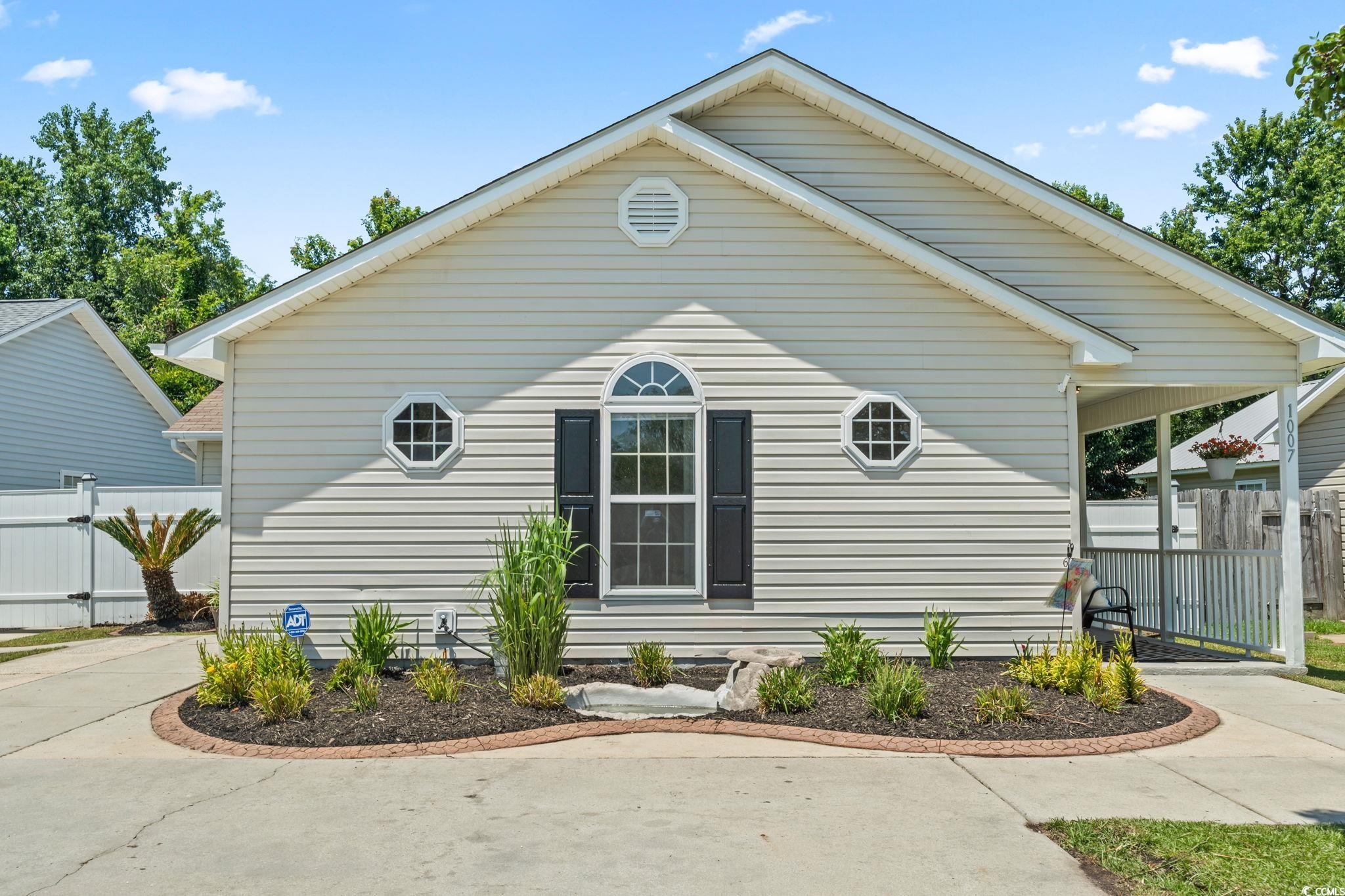 1007 Autumn Drive Murrells Inlet, SC 29576 - Photo 2 of 33 View of side of home