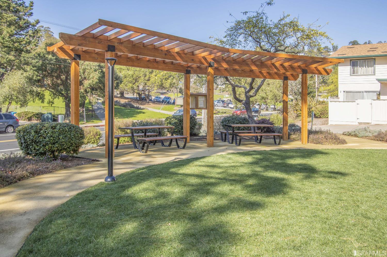 1253 Terra Nova Boulevard Pacifica, CA 94044 - Photo 22 of 23 a view of a house with backyard porch and sitting area