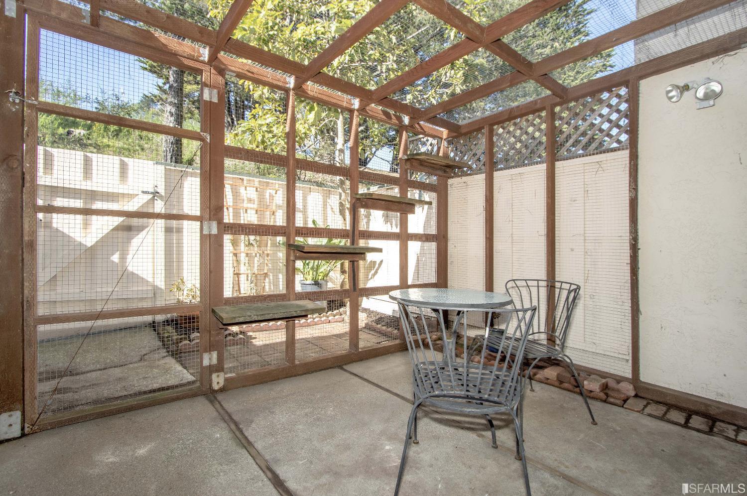 1253 Terra Nova Boulevard Pacifica, CA 94044 - Photo 3 of 23 a dining room with furniture and large windows