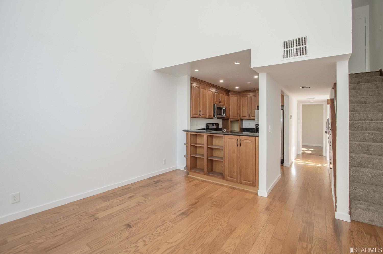 1253 Terra Nova Boulevard Pacifica, CA 94044 - Photo 5 of 23 a view of kitchen with wooden floor