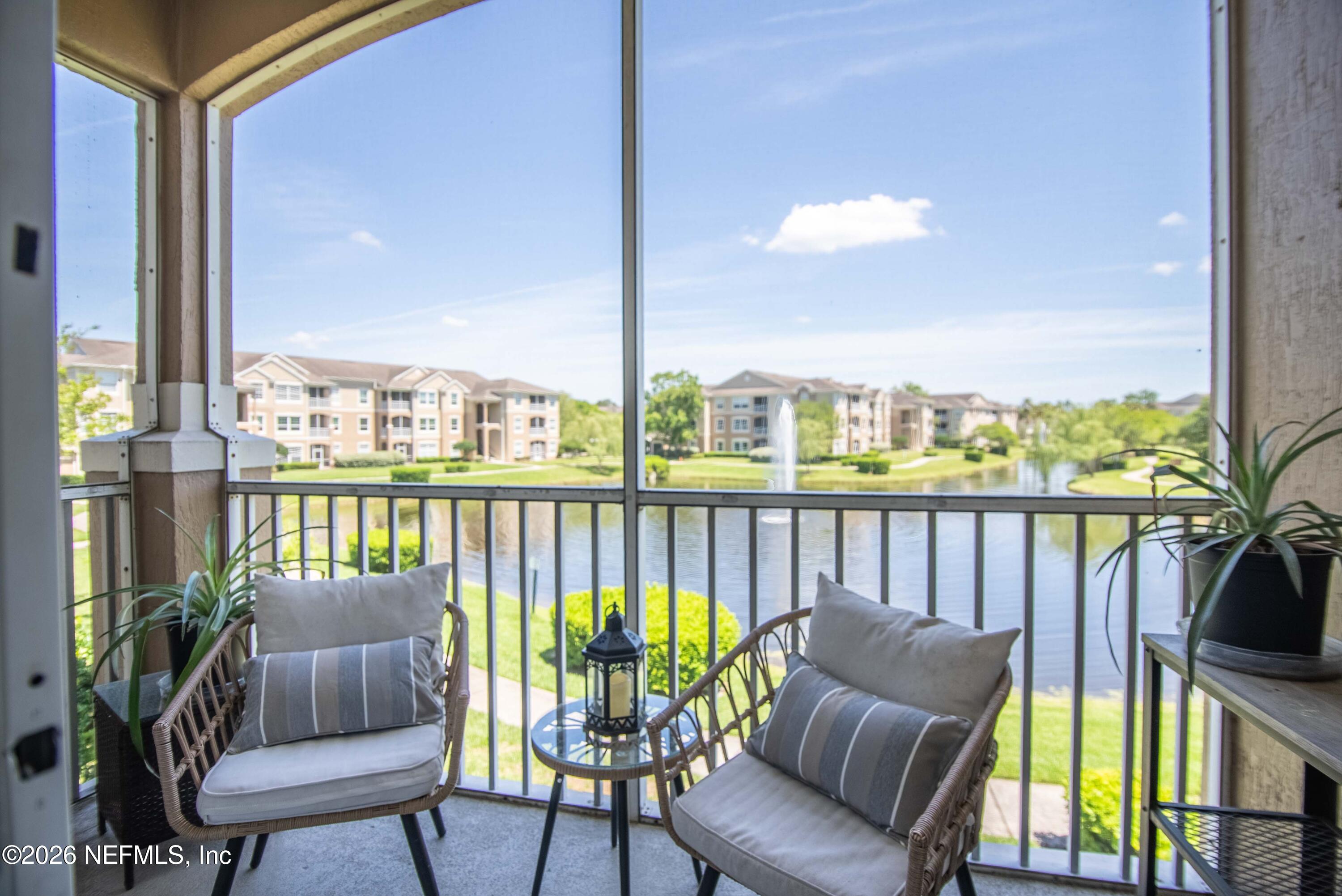a balcony with wooden floor