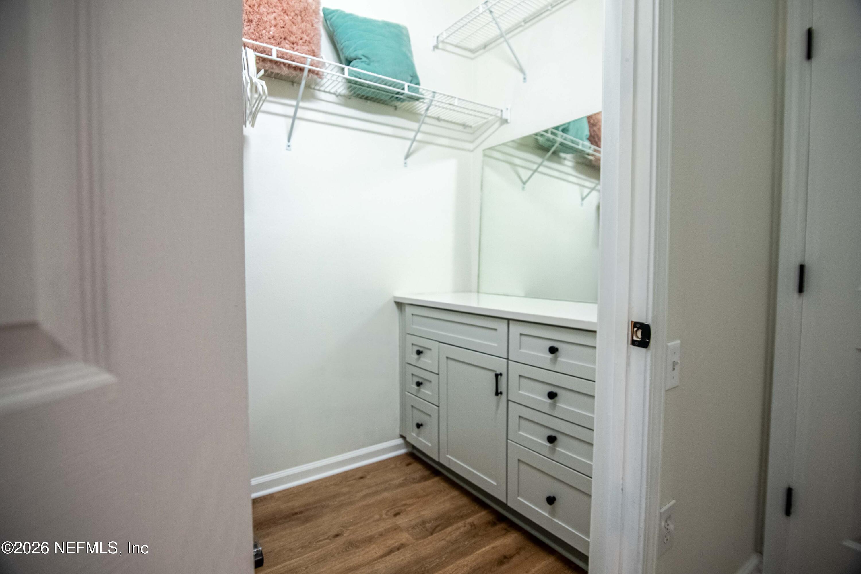7990 Baymeadows Road East, Unit 823 Jacksonville, FL 32256 - Photo 19 of 45 a view of a dresser