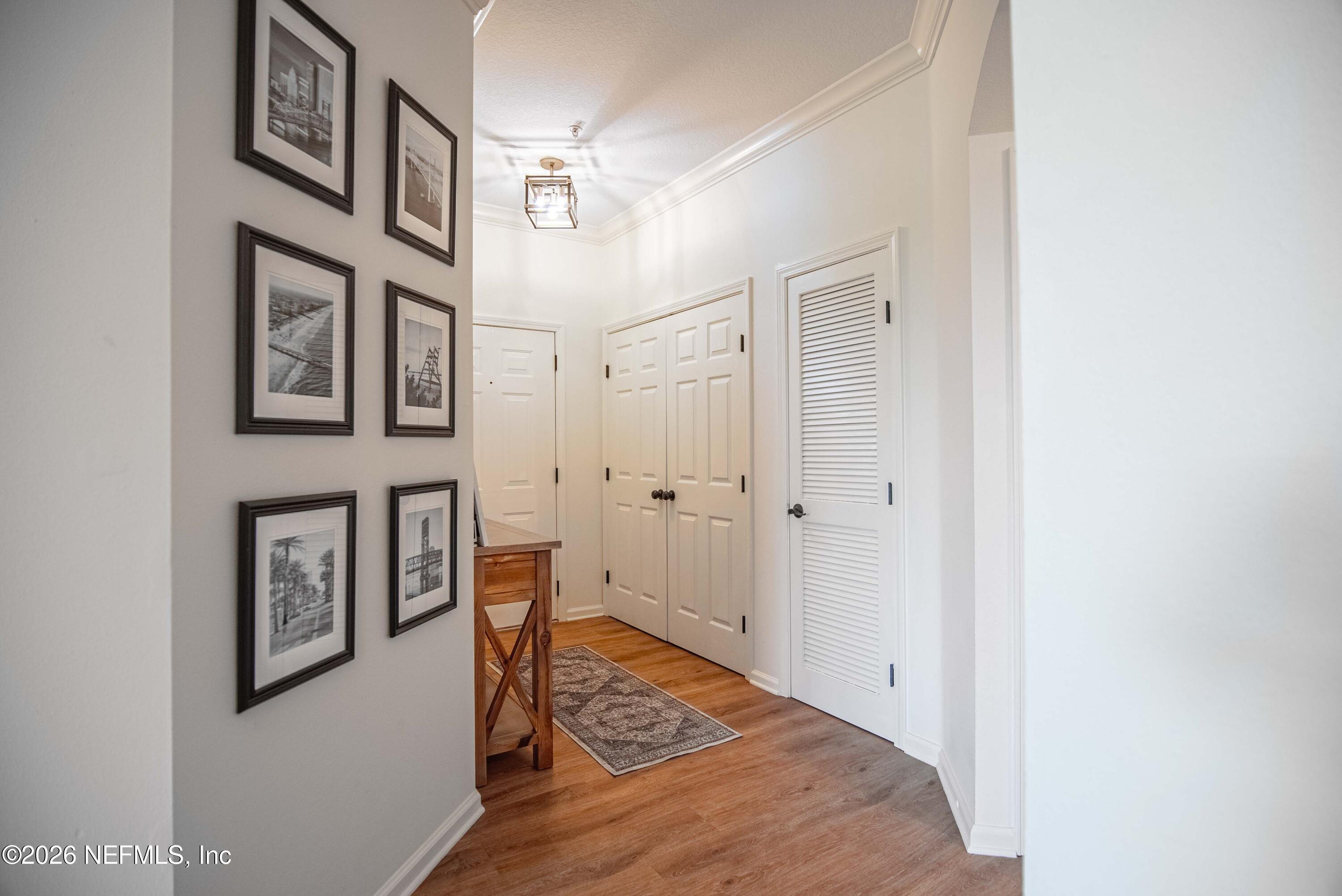 7990 Baymeadows Road East, Unit 823 Jacksonville, FL 32256 - Photo 27 of 45 a view of a hallway to rooms