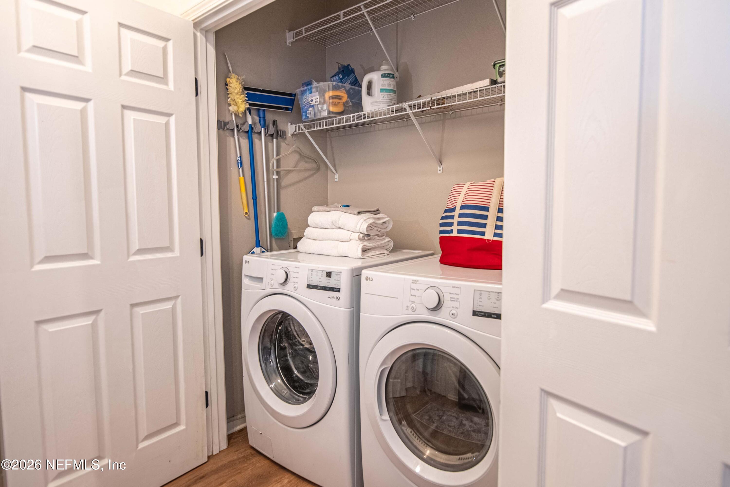 7990 Baymeadows Road East, Unit 823 Jacksonville, FL 32256 - Photo 28 of 45 a utility room with dryer and washer