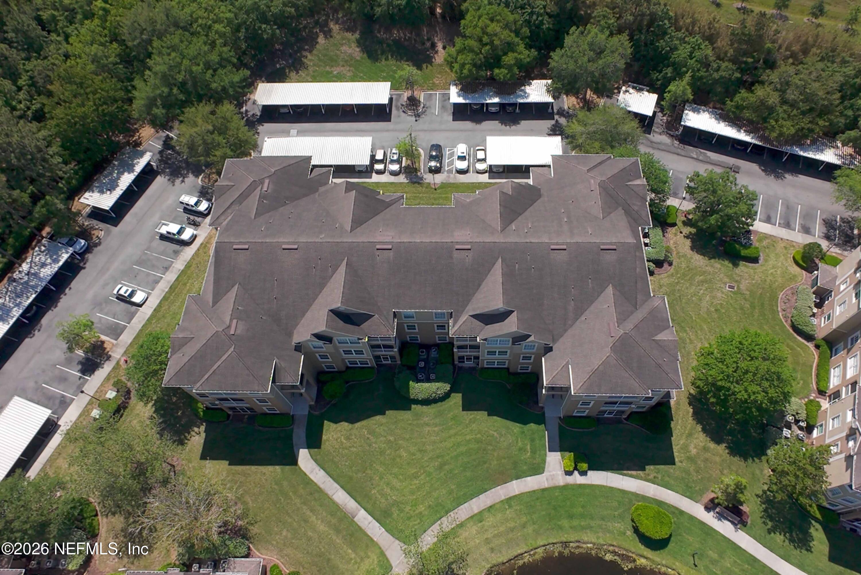 7990 Baymeadows Road East, Unit 823 Jacksonville, FL 32256 - Photo 34 of 45 an aerial view of a house with outdoor space