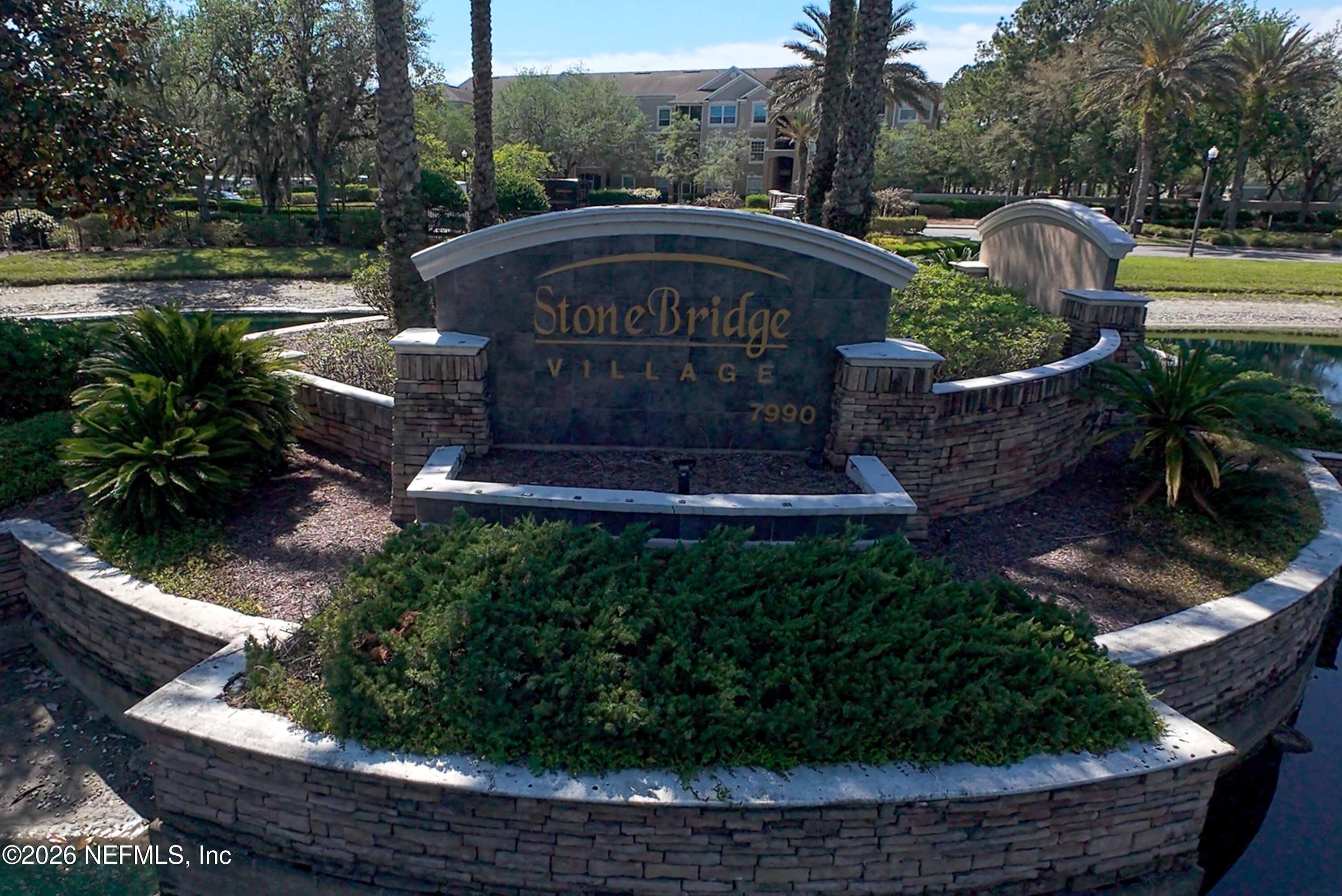 7990 Baymeadows Road East, Unit 823 Jacksonville, FL 32256 - Photo 41 of 45 a view of a garden with sitting area
