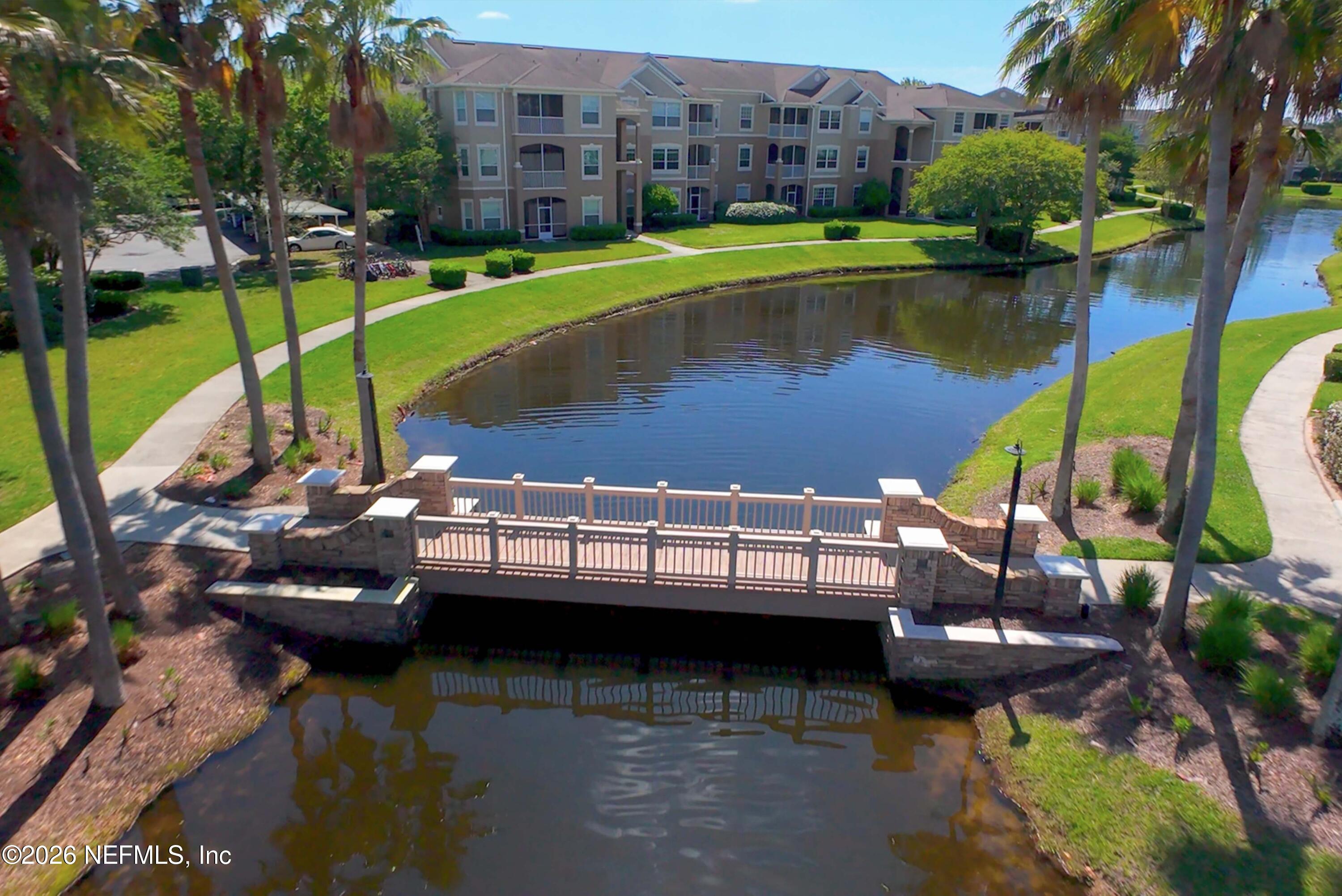 7990 Baymeadows Road East, Unit 823 Jacksonville, FL 32256 - Photo 42 of 45 a view of swimming pool with a lake view