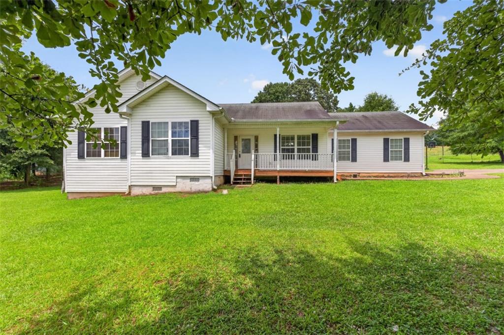 602 Pendergrass Road Winder, GA 30680 - Photo 2 of 44 a front view of house with yard and green space