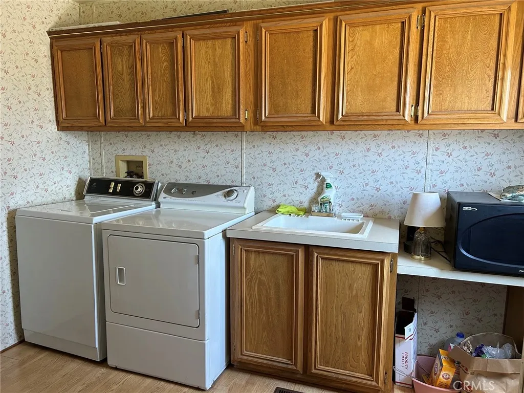 27250 Murrieta Road, Unit 347 Menifee, CA 92586 - Photo 29 of 38 a utility room with dryer and washer