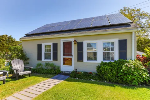front view of a house with a yard