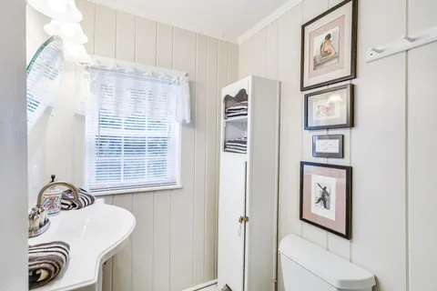a view of a livingroom with a camera next to a window