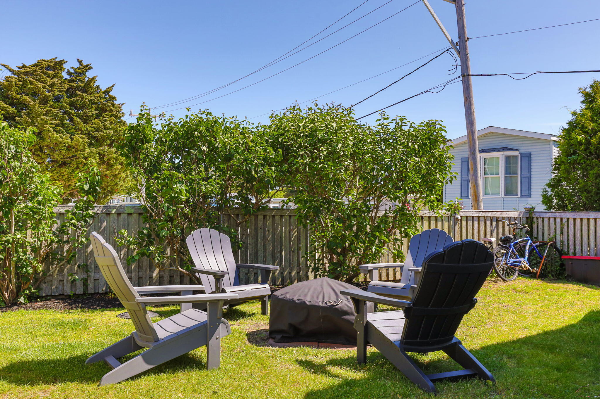 164 Kendrick Avenue, Unit B Wellfleet, MA 02667 - Photo 19 of 32 a view of a swimming pool with a patio and a yard