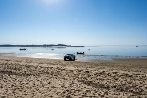 a view of a refrigerator and an ocean view