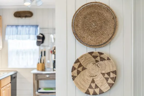view of kitchen with a sink and a mirror