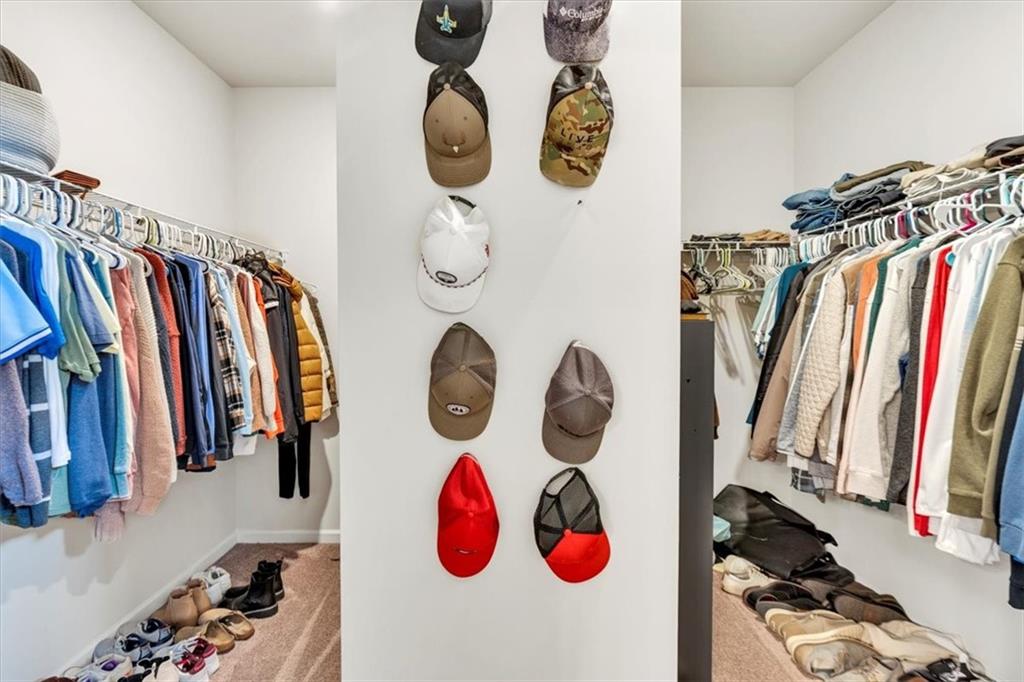 24 Jackson Farm Road Cartersville, GA 30120 - Photo 26 of 50 a view of walk in closet with clothes and shoes
