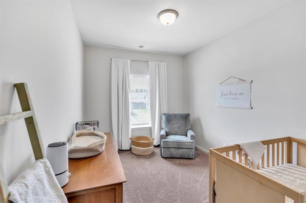 24 Jackson Farm Road Cartersville, GA 30120 - Photo 29 of 50 a living room with furniture and a window