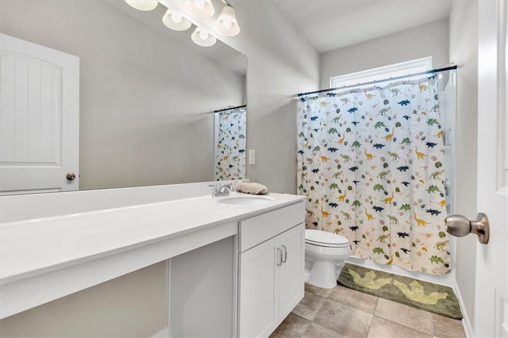 24 Jackson Farm Road Cartersville, GA 30120 - Photo 30 of 50 a bathroom with a sink toilet and shower