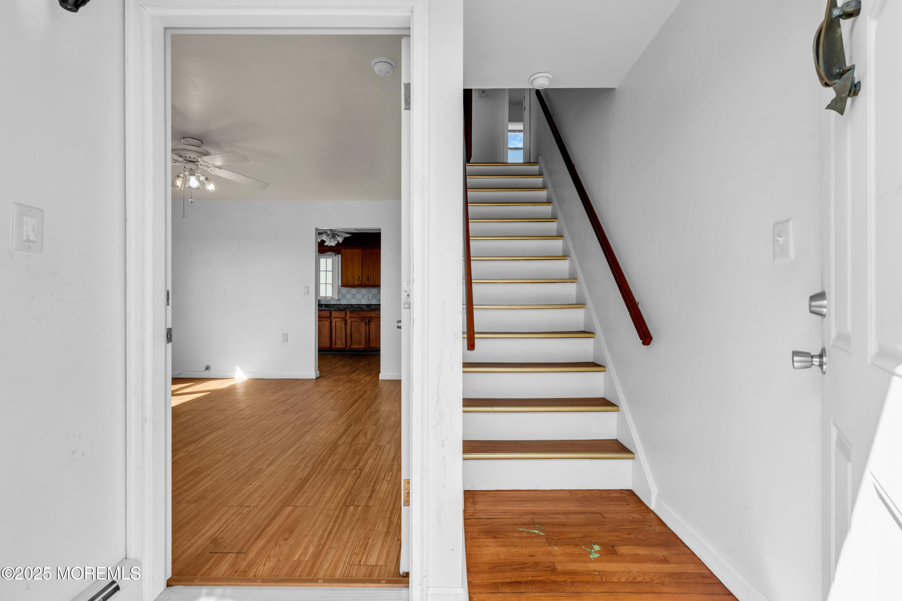 538 Front Street Union Beach, NJ 07735 - Photo 17 of 46 a view of a hallway with wooden floor and entryway