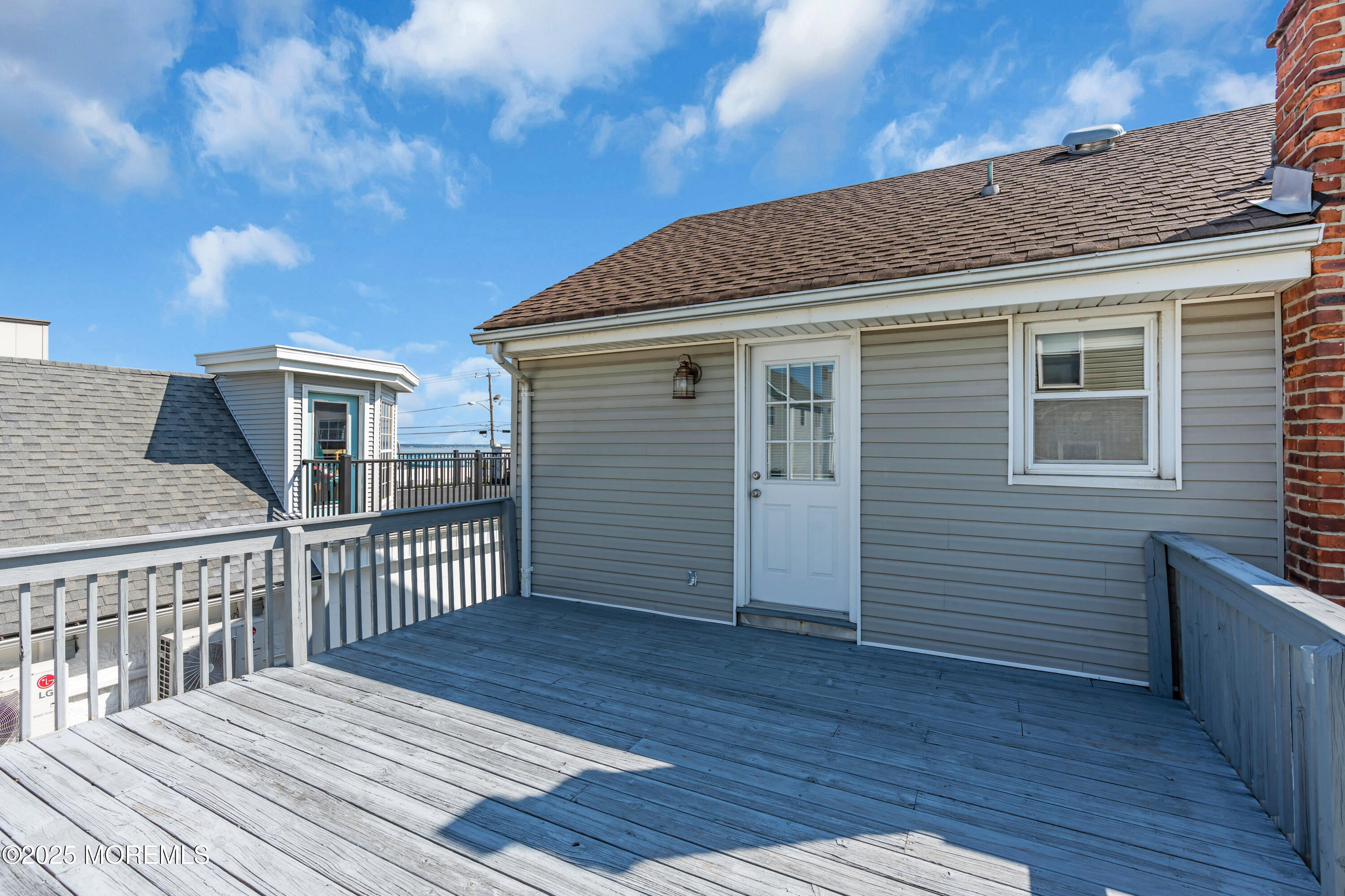 538 Front Street Union Beach, NJ 07735 - Photo 28 of 46 a view of a house with wooden deck
