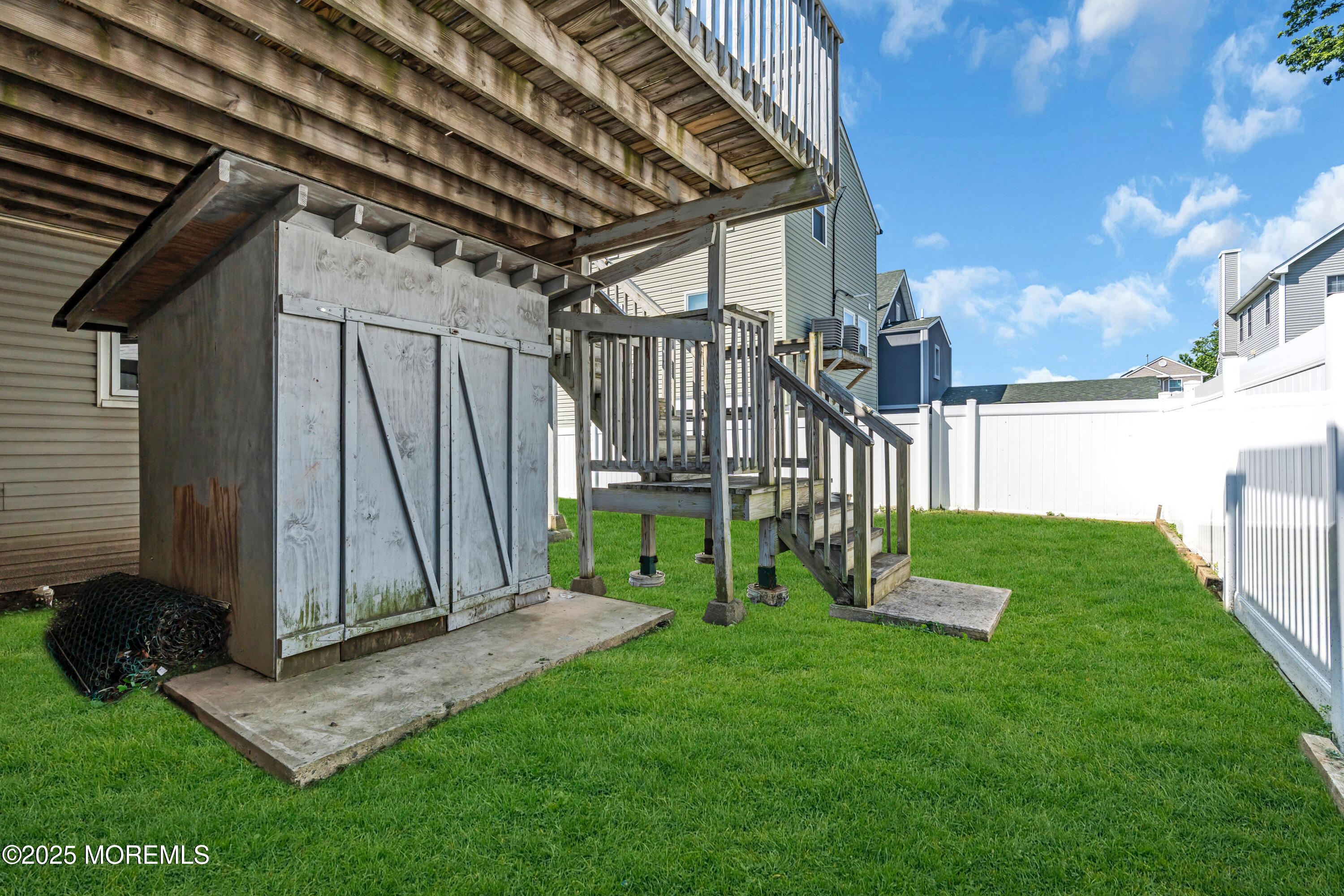 538 Front Street Union Beach, NJ 07735 - Photo 30 of 46 a view of a backyard with a garden