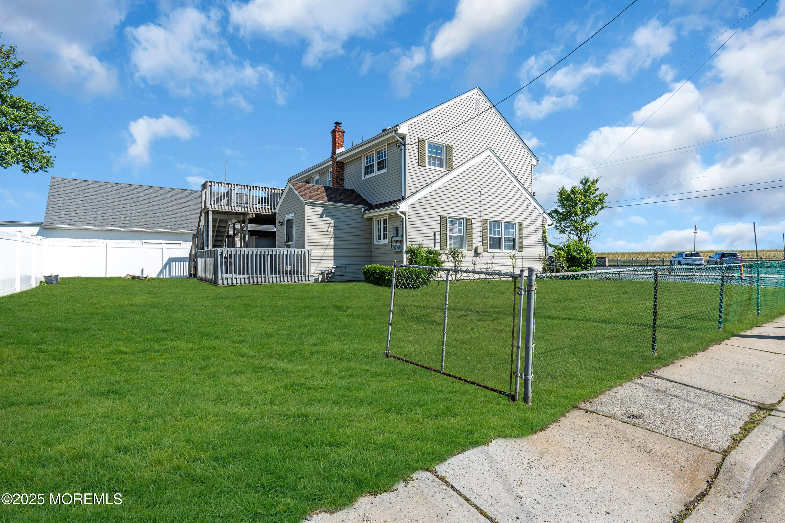 538 Front Street Union Beach, NJ 07735 - Photo 34 of 46 a view of a house with backyard and a garden