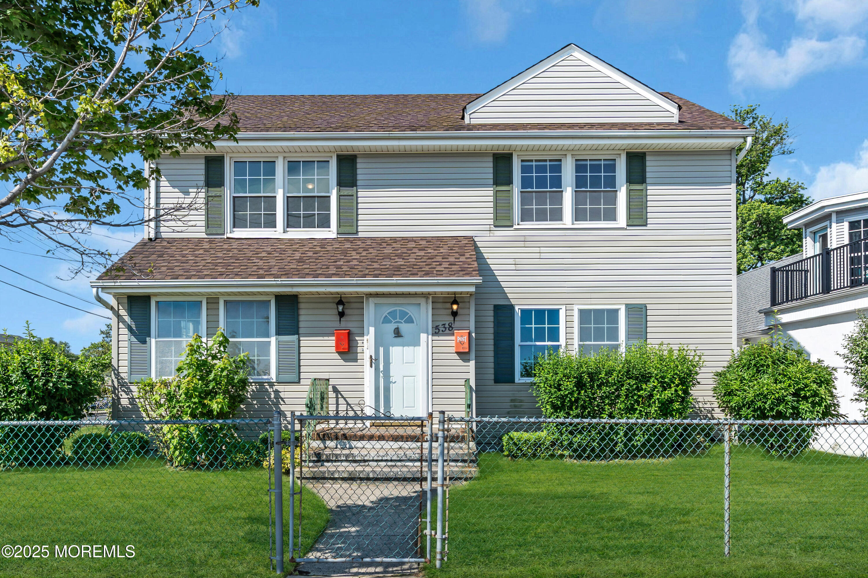 538 Front Street Union Beach, NJ 07735 - Photo 4 of 46 a front view of a house with a yard