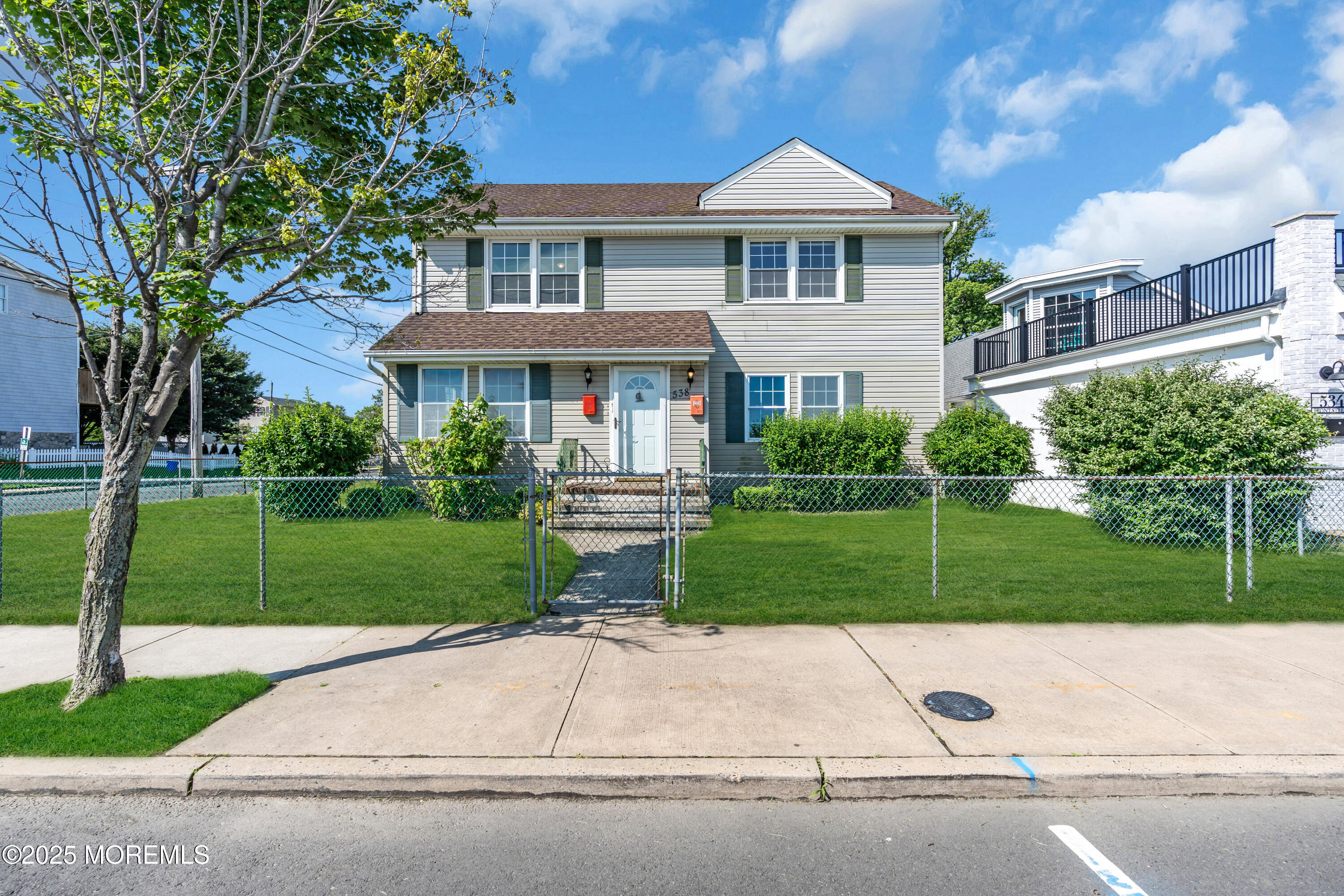 538 Front Street Union Beach, NJ 07735 - Photo 45 of 46 front view of house with a yard