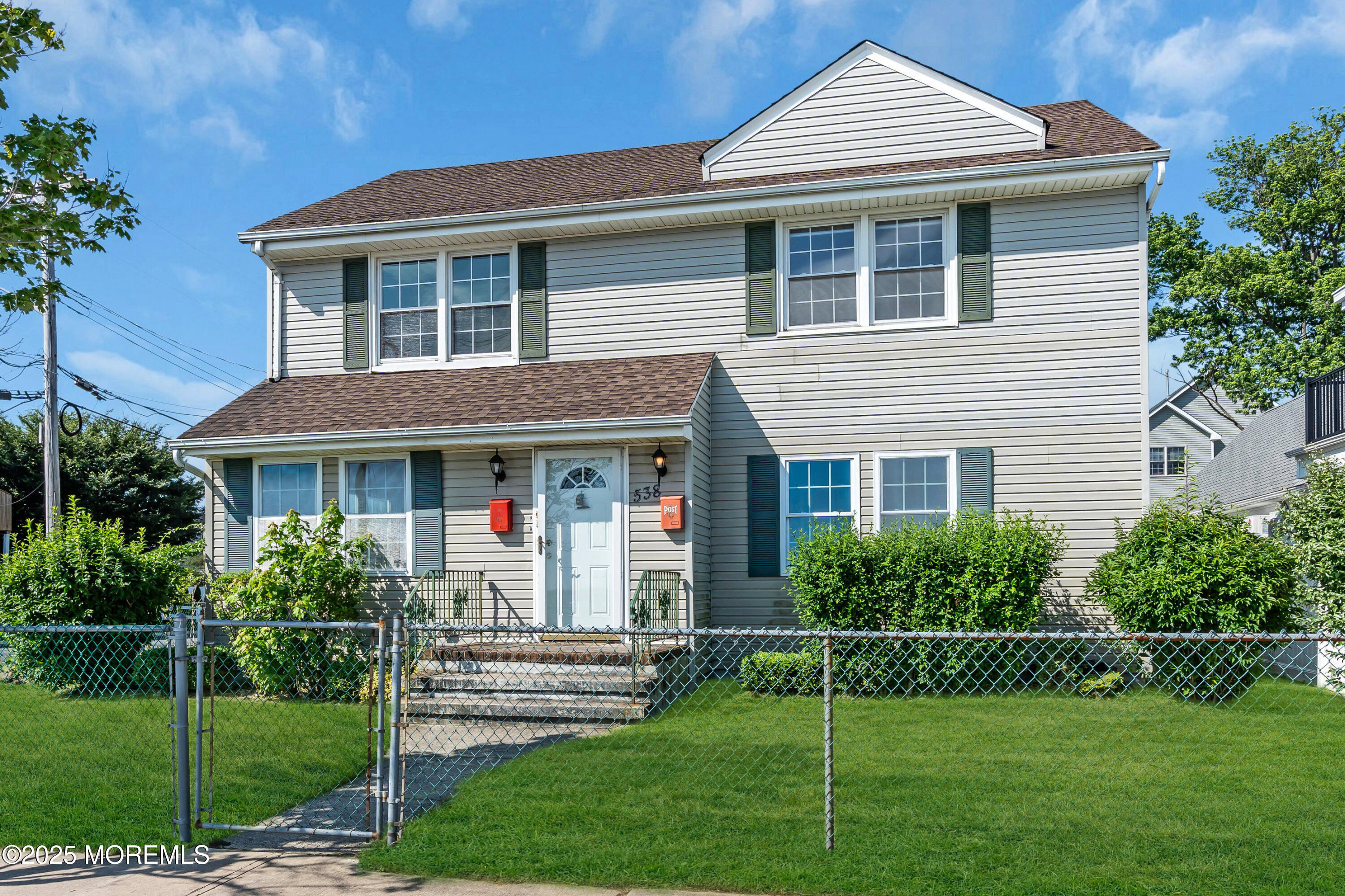538 Front Street Union Beach, NJ 07735 - Photo 46 of 46 a front view of a house with a yard