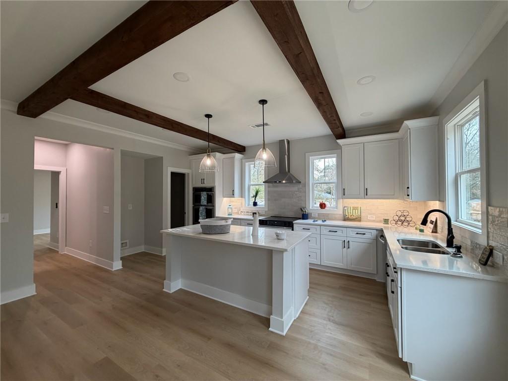1706 Cunningham Road Southwest Marietta, GA 30008 - Photo 11 of 27 a kitchen with cabinets a sink and appliances