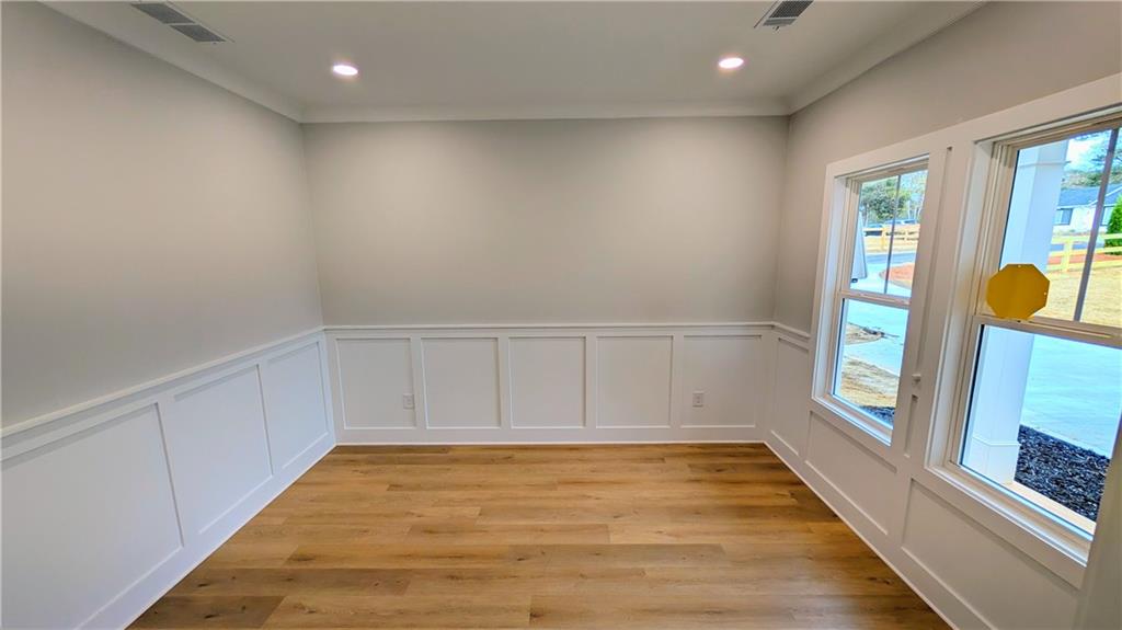 1706 Cunningham Road Southwest Marietta, GA 30008 - Photo 13 of 27 a view of an empty room with a window