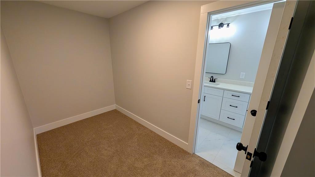 1706 Cunningham Road Southwest Marietta, GA 30008 - Photo 21 of 27 wooden floor in a bathroom